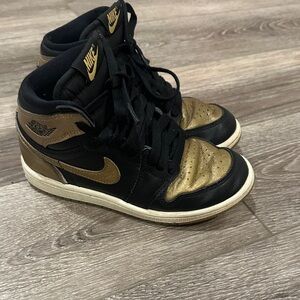 Nike Black and Gold High-Tops